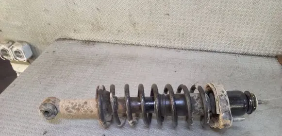 Mitsubishi Lancer VIII Rear shock absorber with coil spring
