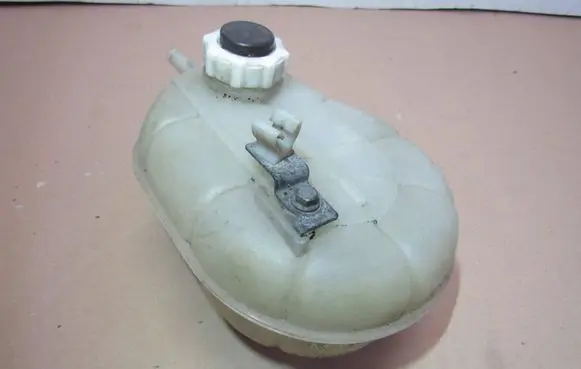 Opel Movano A Coolant expansion tank/reservoir 7700838740