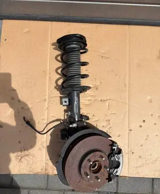 Ford Focus Front shock absorber with coil spring JX6C18B060BF