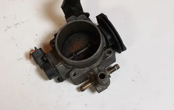 Dacia Logan I Throttle body valve 7700871215