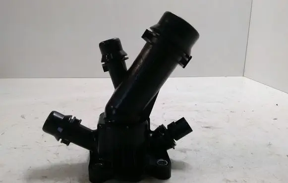 Thermostat/thermostat housing
