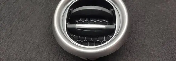 Dash center air vent grill