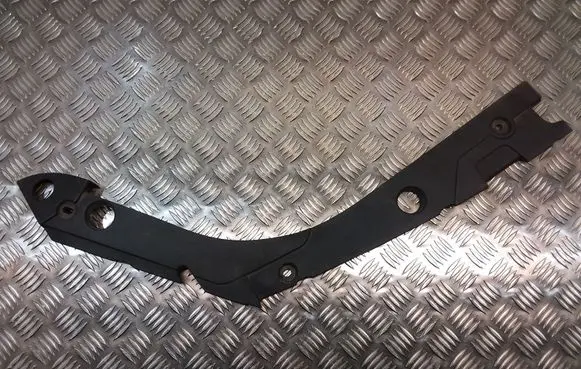 Engine bonnet/hood lock trim molding