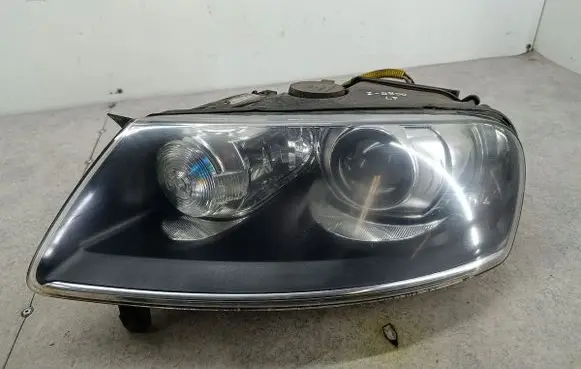 Volkswagen Touareg I Headlight/headlamp 7L6941015AM