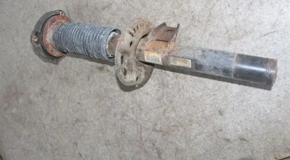 Volkswagen Caddy Front shock absorber/damper 1K0413031BA