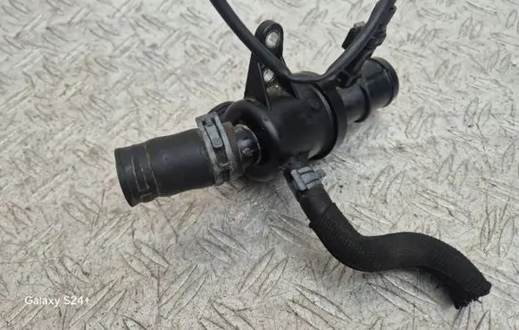 Thermostat/thermostat housing