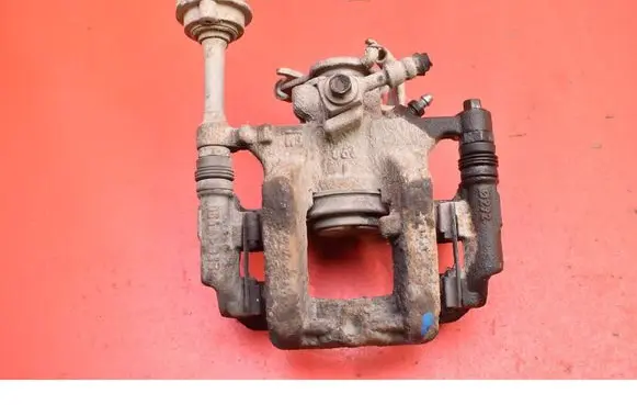 Opel Astra J Rear brake caliper