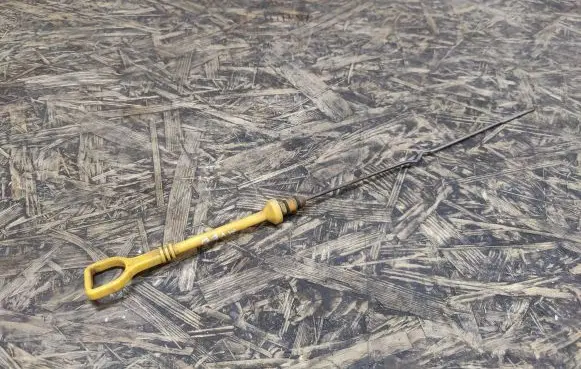 Oil level dip stick
