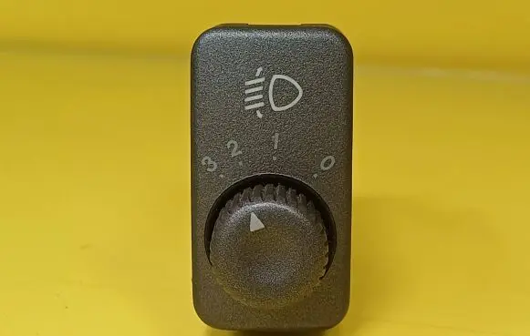 KIA Carnival Headlight level height control switch