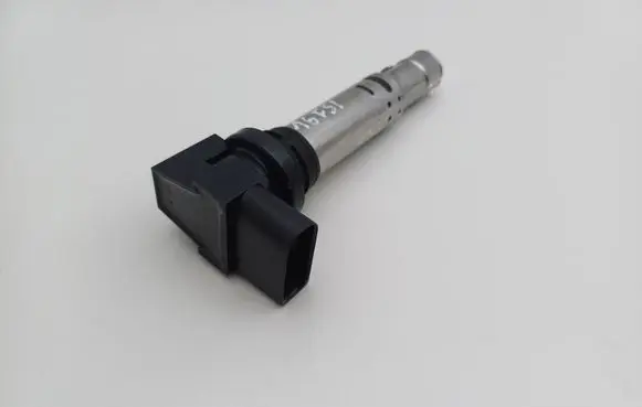 Volkswagen Touran I High voltage ignition coil 036905715H