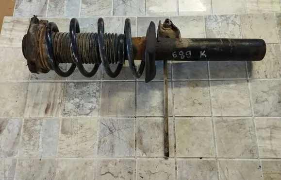 Volkswagen Golf Plus Front shock absorber with coil spring