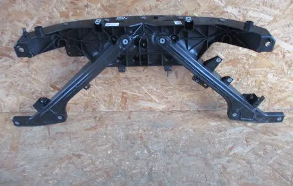 Top upper radiator support slam panel