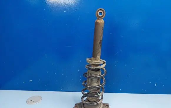 Nissan Primera Rear shock absorber with coil spring 5210AV400