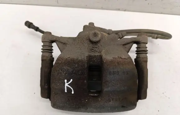 Volkswagen Golf VII Front brake caliper