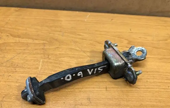Subaru Impreza II Rear door check strap stopper