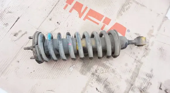 Nissan Navara D40 Front shock absorber with coil spring SKO62815