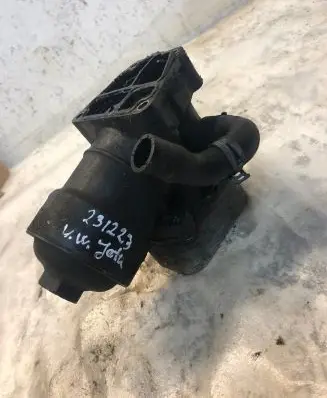 Volkswagen Jetta VI Oil filter mounting bracket 03l117021c