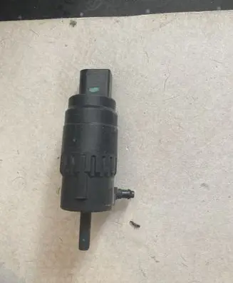 Volkswagen Golf VI Headlight washer nozzle holder 1K6955651