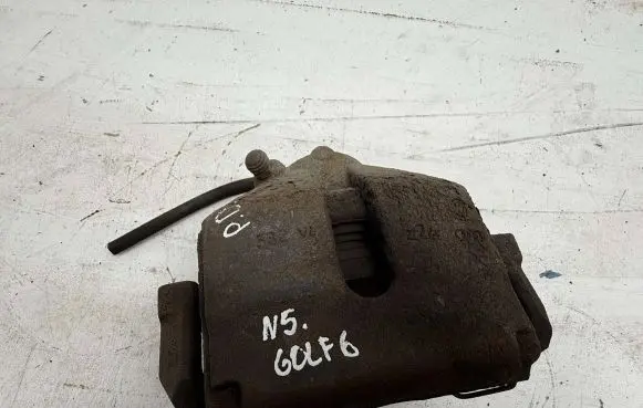 Volkswagen Golf VI Front brake caliper