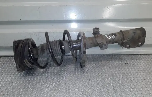 Renault Clio III Front shock absorber with coil spring 