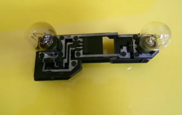 Nissan Primera Tail light bulb cover holder 2331