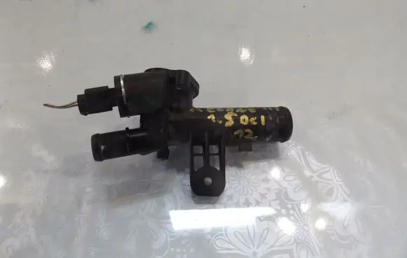 Thermostat/thermostat housing
