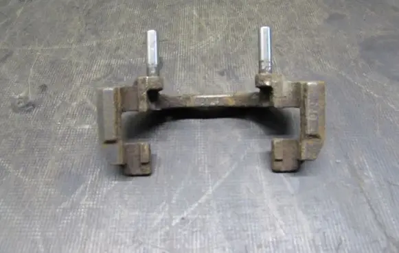 Mazda 3 I Front Brake Caliper Pad/Carrier 