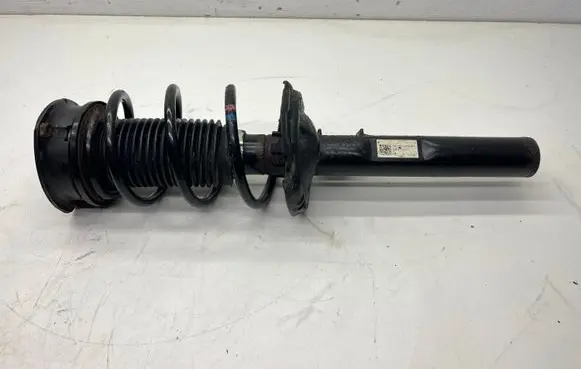 Volkswagen Golf VII Front shock absorber with coil spring 5Q0413023FH 5Q04GH