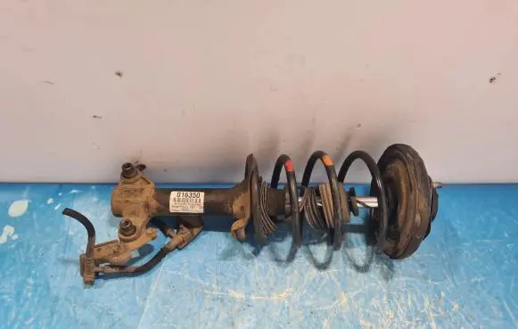 Nissan Primera Front shock absorber/damper 54302AVZ00