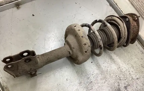 Subaru Forester SH Front shock absorber with coil spring