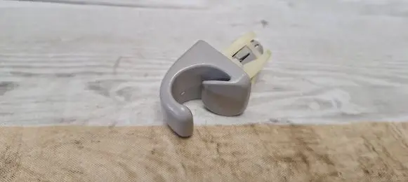 Sun visor clip/hook/bracket