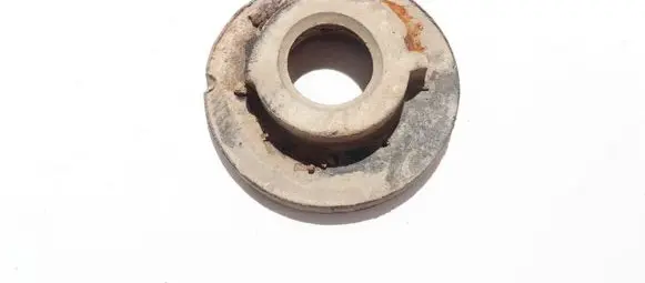 Volkswagen Touran I Front coil spring rubber mount 1k0512297