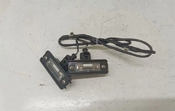 Volkswagen Golf IV Number plate light 1J6943021