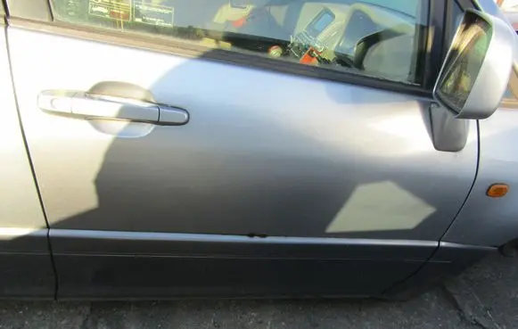 Cadillac SRX Front door 