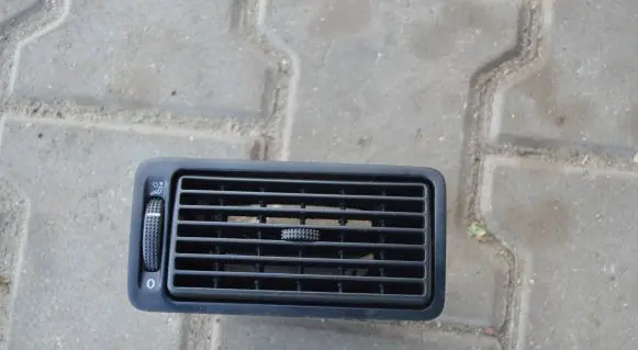 Volkswagen Golf IV Dash center air vent grill 1J1819704C