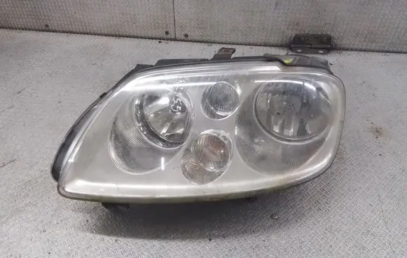 Volkswagen Touran I Headlight/headlamp 1T0941005M