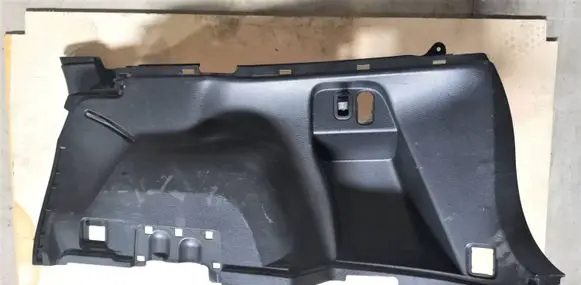 Trunk/boot lower side trim panel