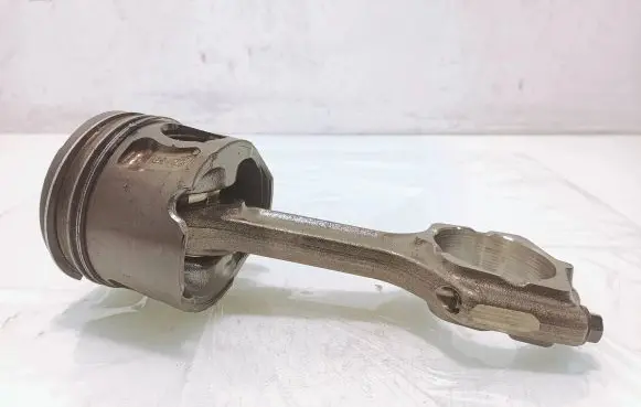 Piston with connecting rod