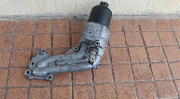 Peugeot Partner Oil filter mounting bracket 9636015110