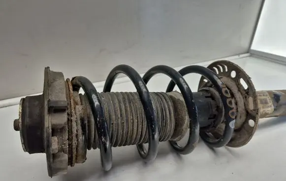 Volkswagen Touran I Front shock absorber with coil spring 1T0413031BP