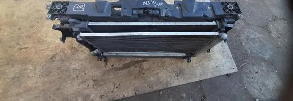 Radiator support slam panel
