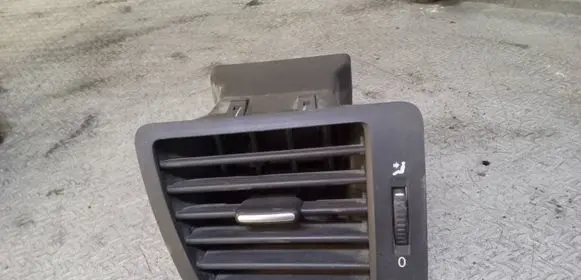 Volkswagen Routan Dashboard side air vent grill/cover trim