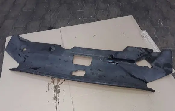 Engine bonnet/hood lock trim molding