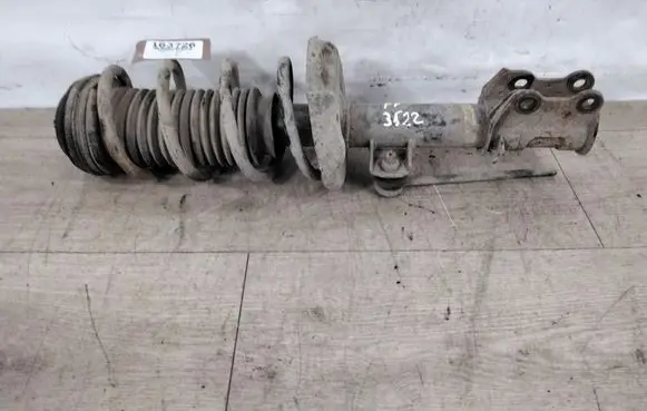 Opel Corsa D Front shock absorber with coil spring