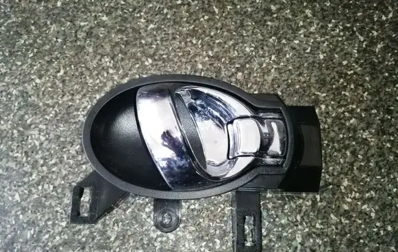 Nissan Juke I F15 Rear door interior handle