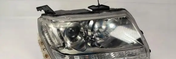 Suzuki Grand Vitara II Headlight/headlamp 100-59079