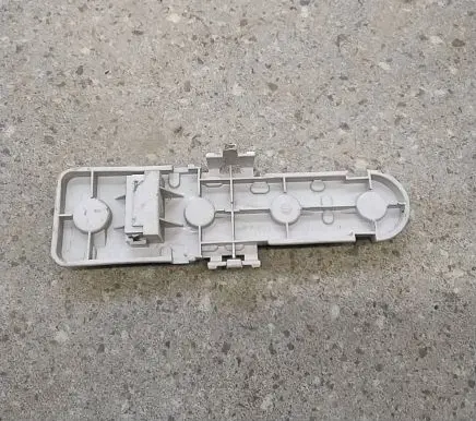 Tail light bulb cover holder