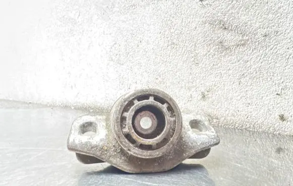 Opel Astra J Front shock absorber mounting bracket 13345960