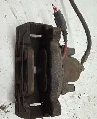 Volkswagen Golf V Front brake caliper