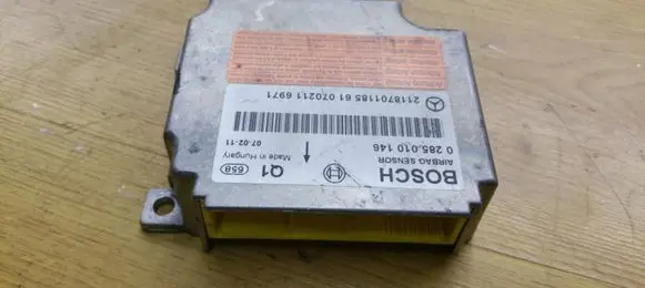 Mercedes-Benz CLS C219 Airbag control unit/module 2118701185 0285010146